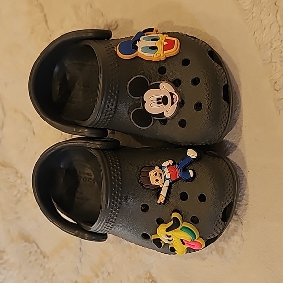 CROCS Other - Crocs comes with the four charms on it